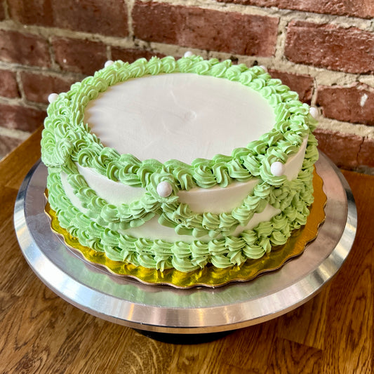 Retro white cake with green trim