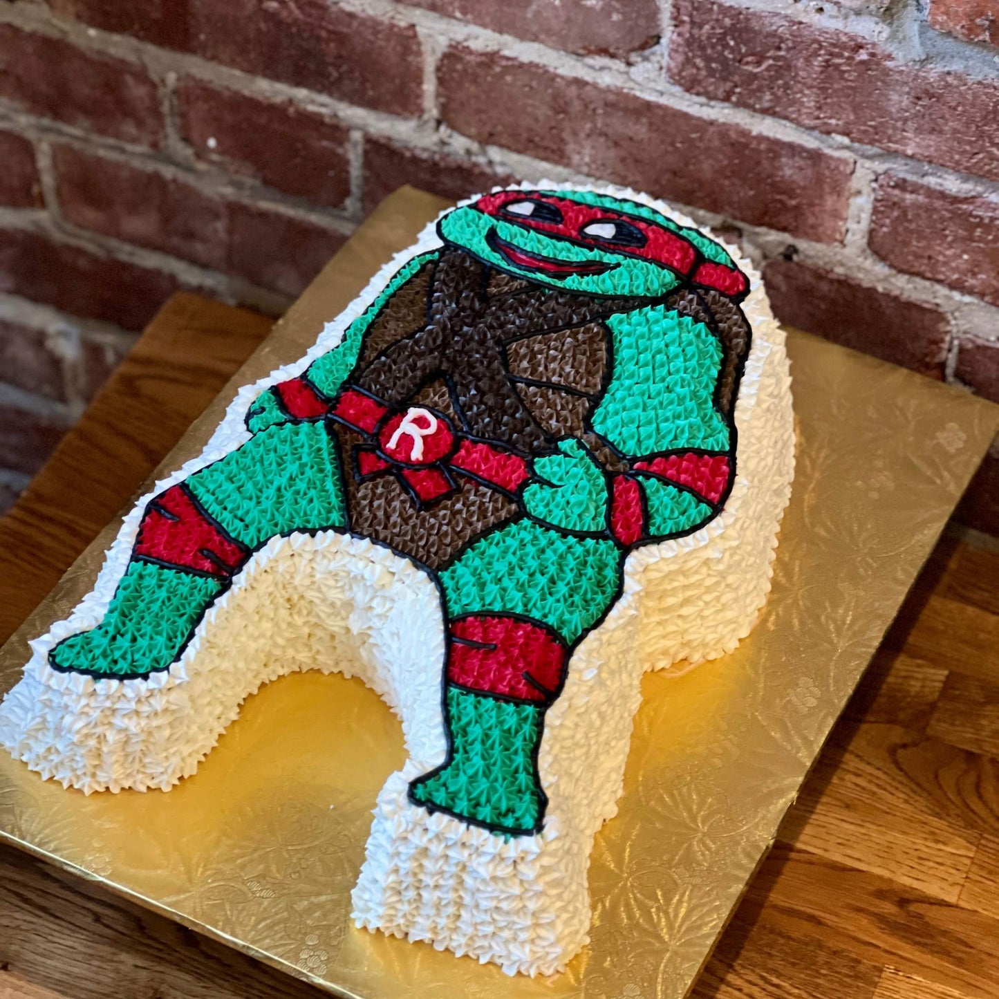 Retro style ninja turtles cake of Raphael