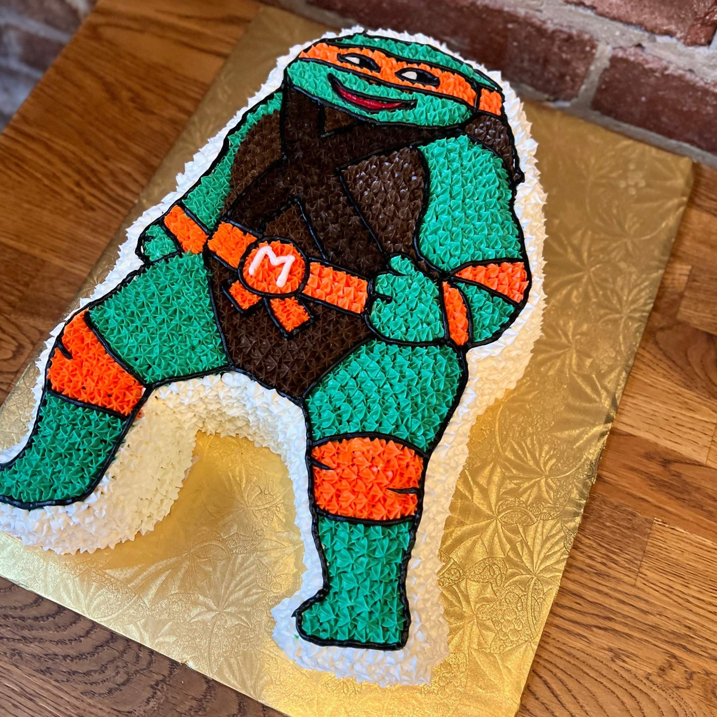 Retro style ninja turtles cake of Michelangelo