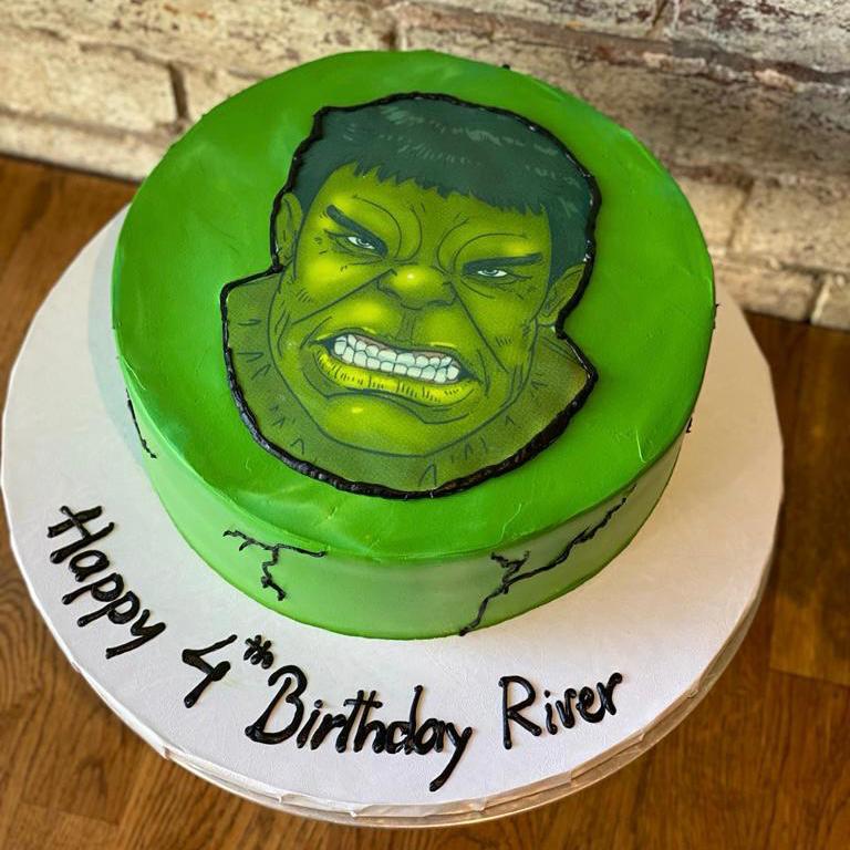 Green Incredible Hulk themed birthday cake