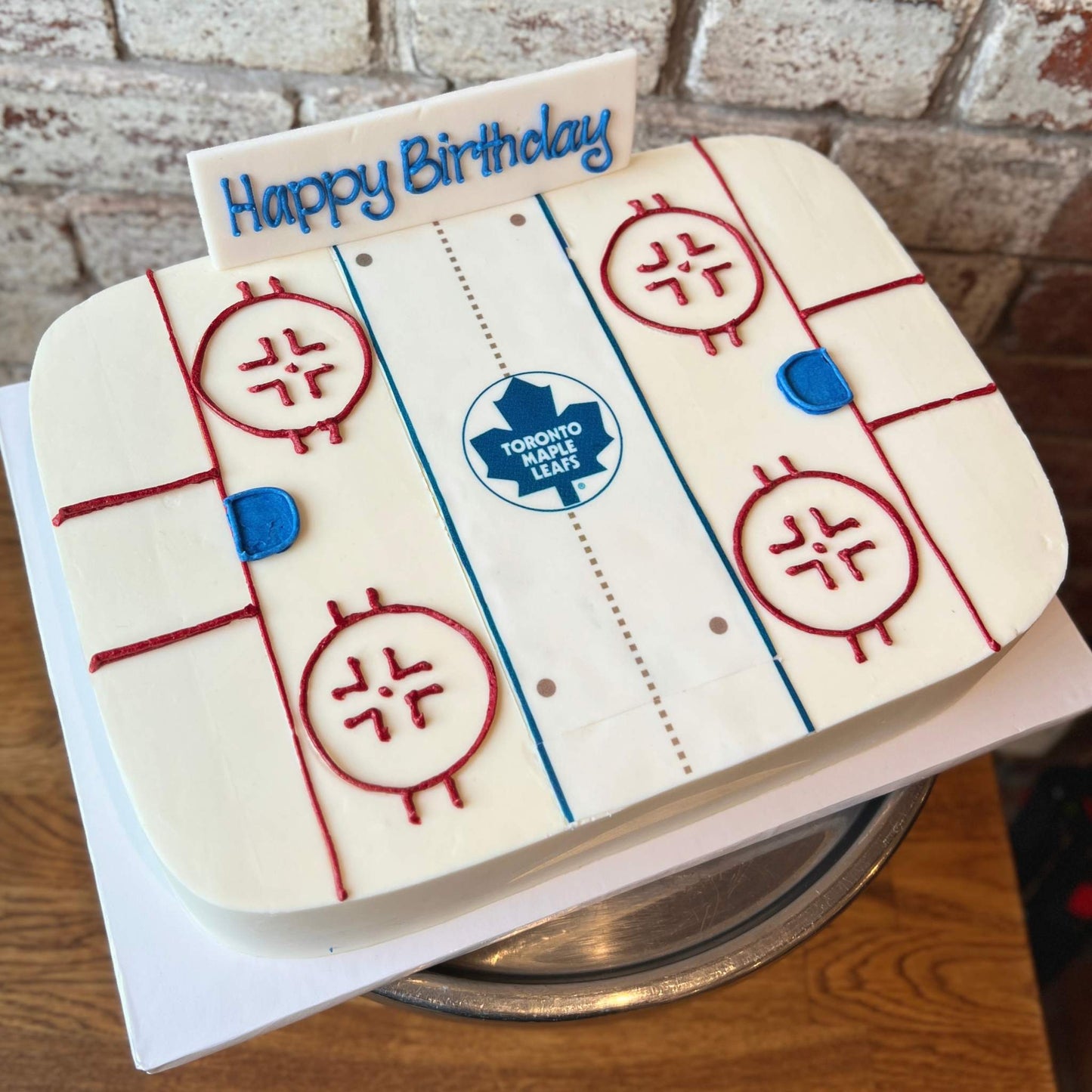 Maple Leafs Hockey Arena Cake