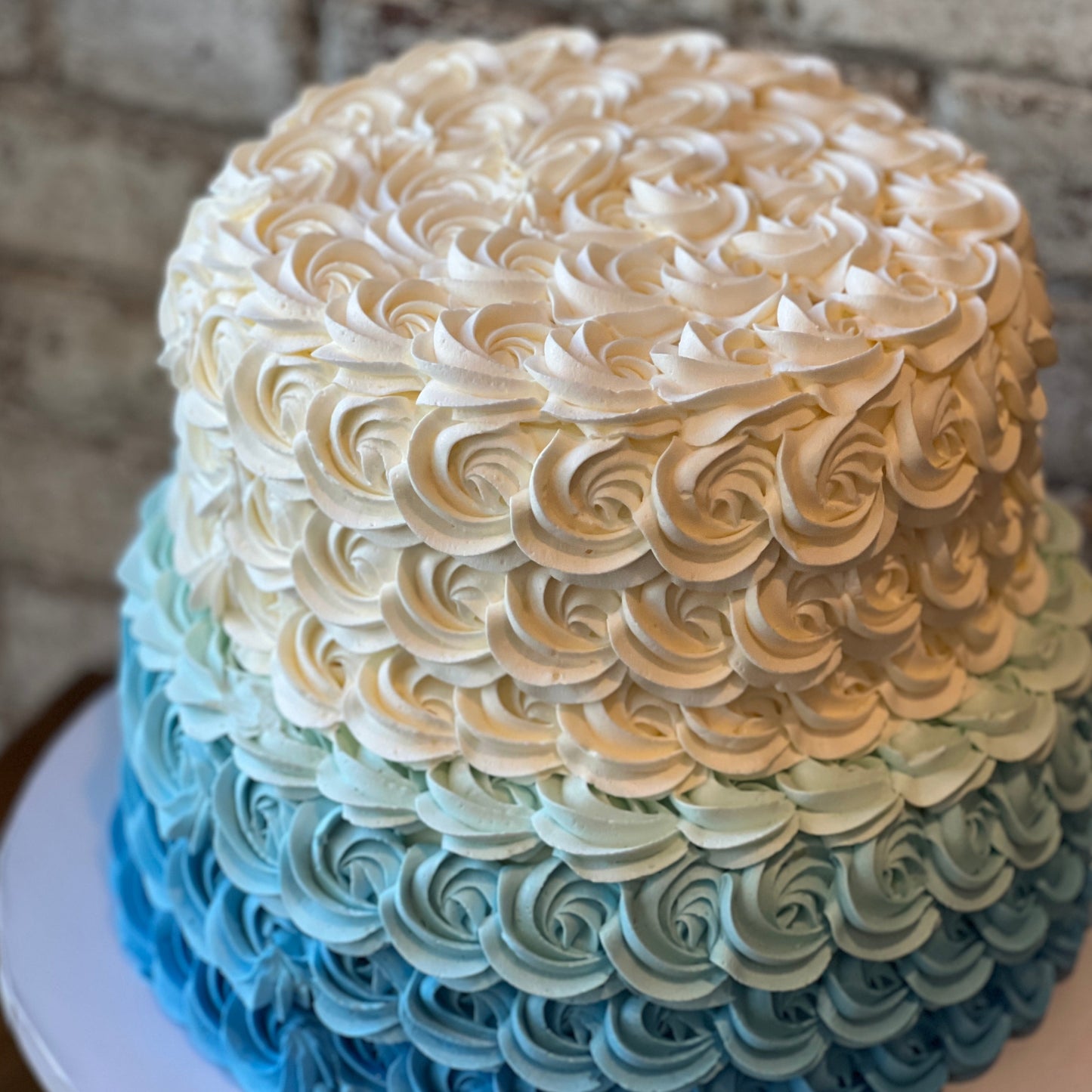 Two-tier rosette ombre cake