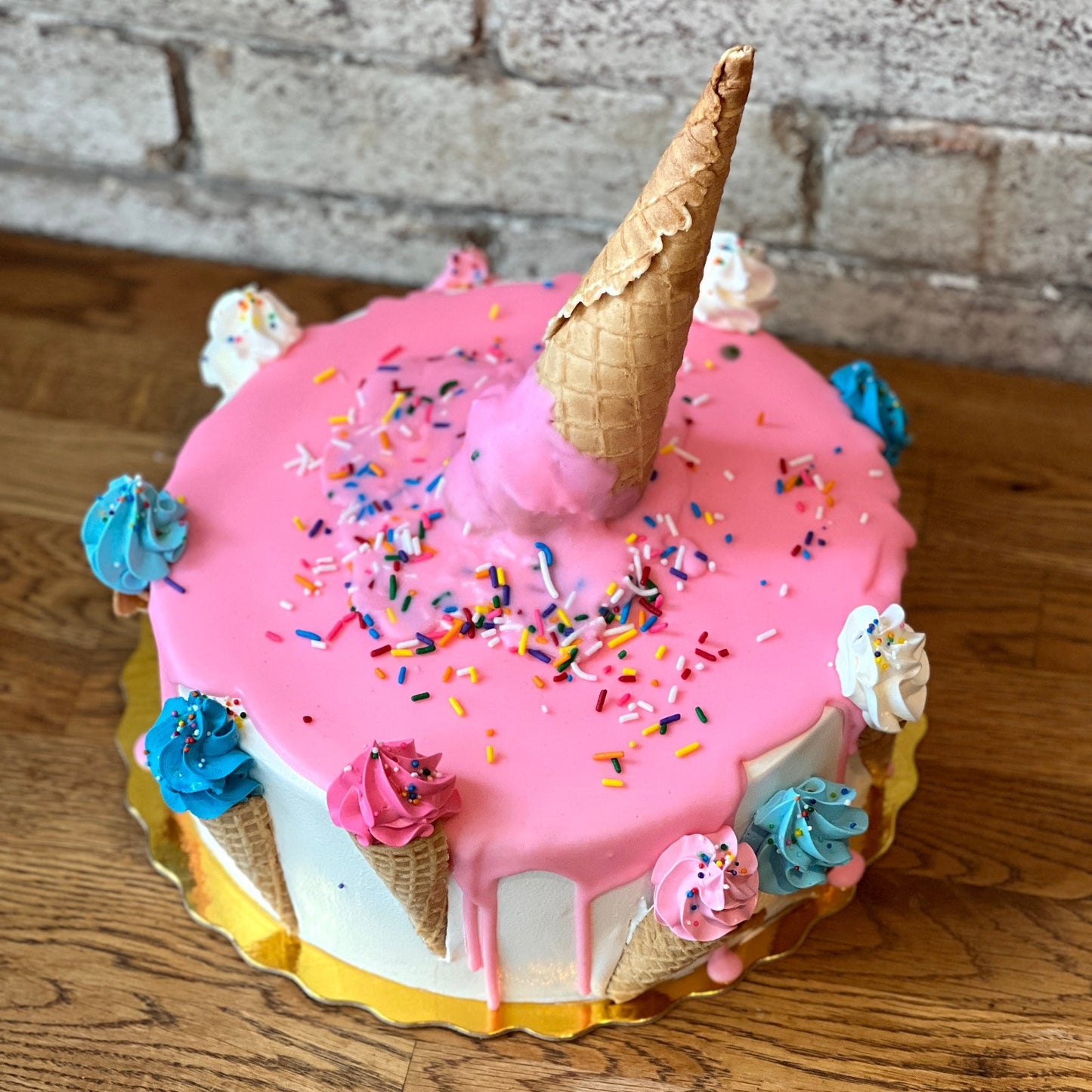 Ice cream cake with upside down cone on top