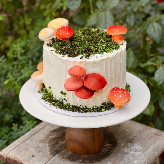 Mushroom themed cake with white base
