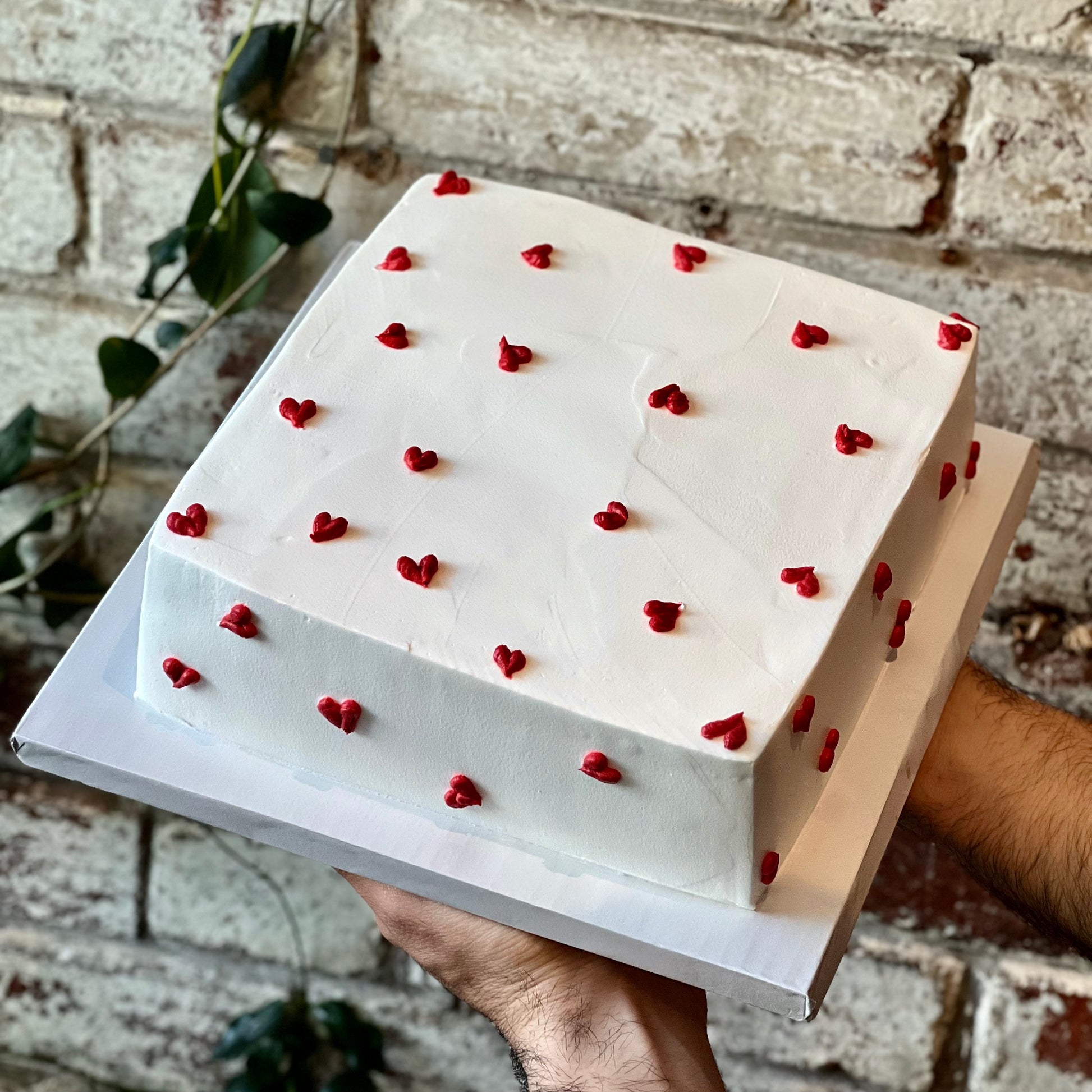 Square white cake tiny red hearts