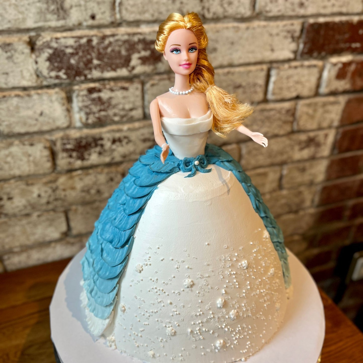 Barbie in a blue dress birthday cake