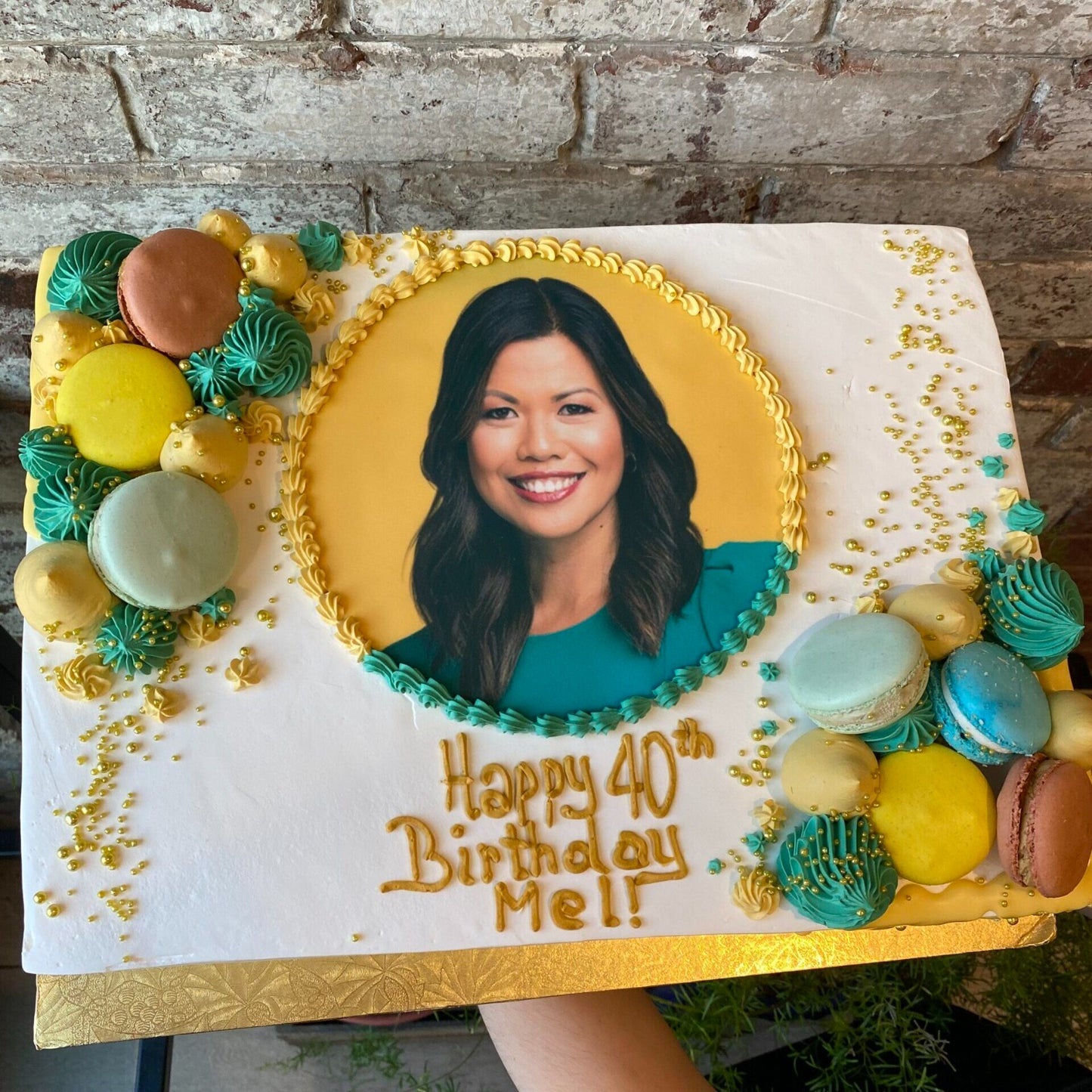 Sheet cake with photo image of person and macarons