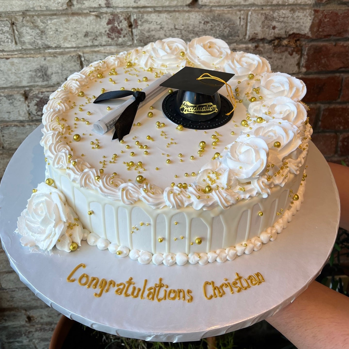 Graduate themed cake with cap and scroll