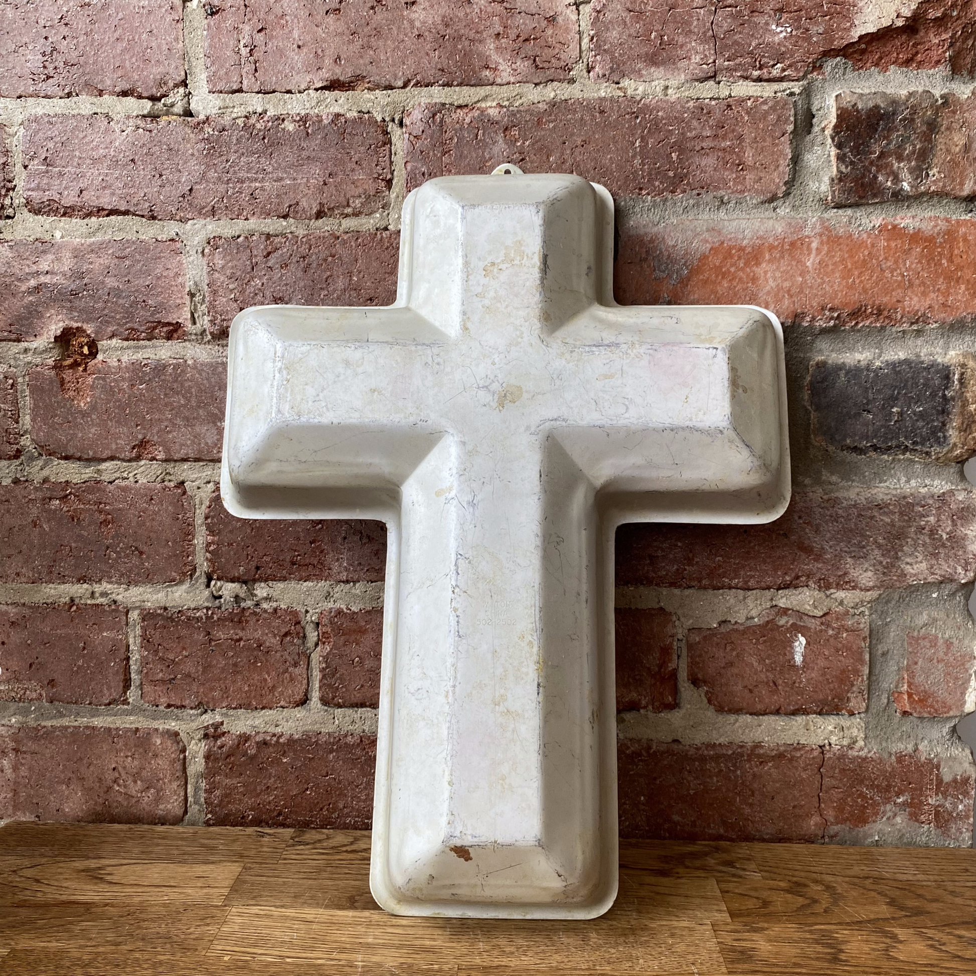 Cross take tin