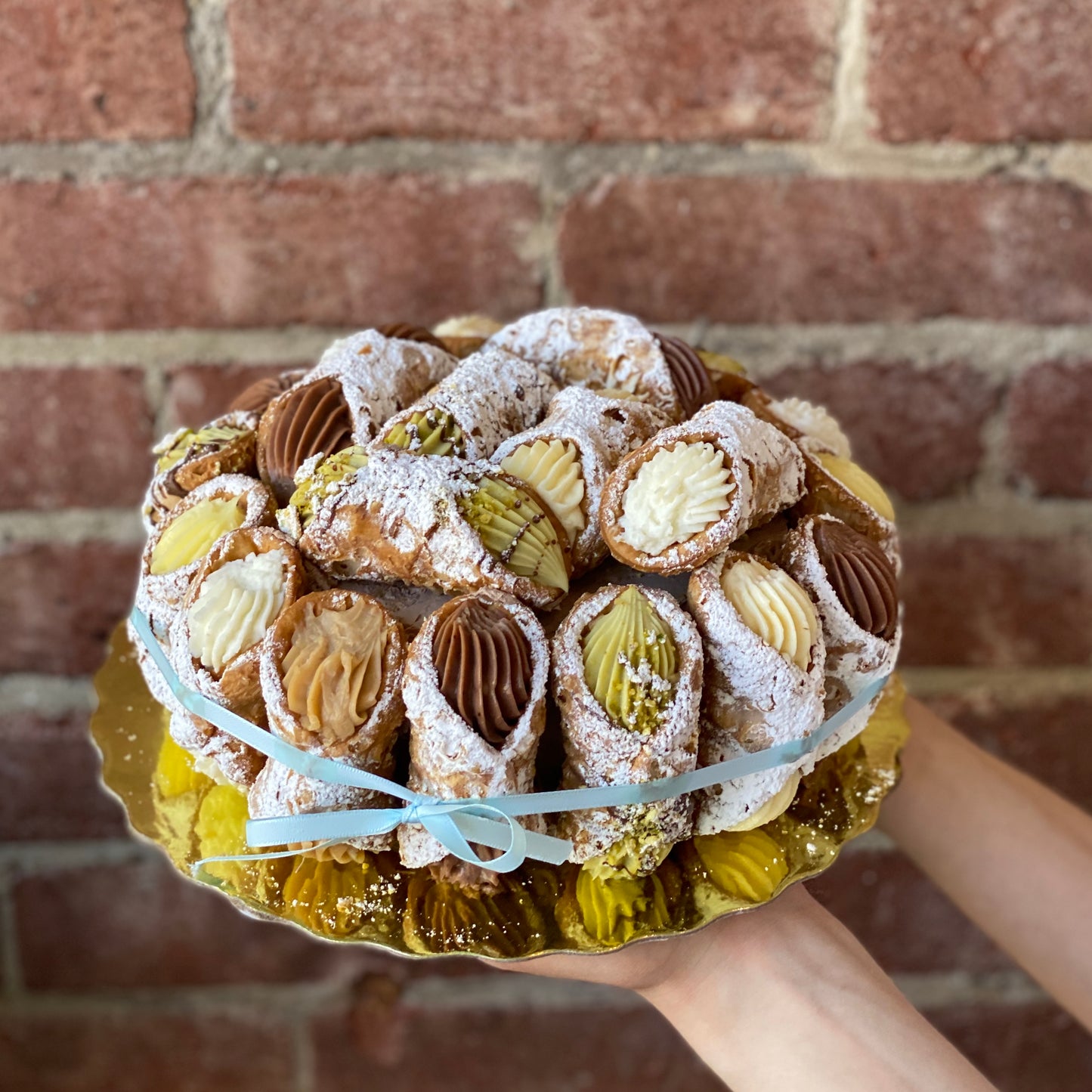 Italian rum caked, covered with cannoli