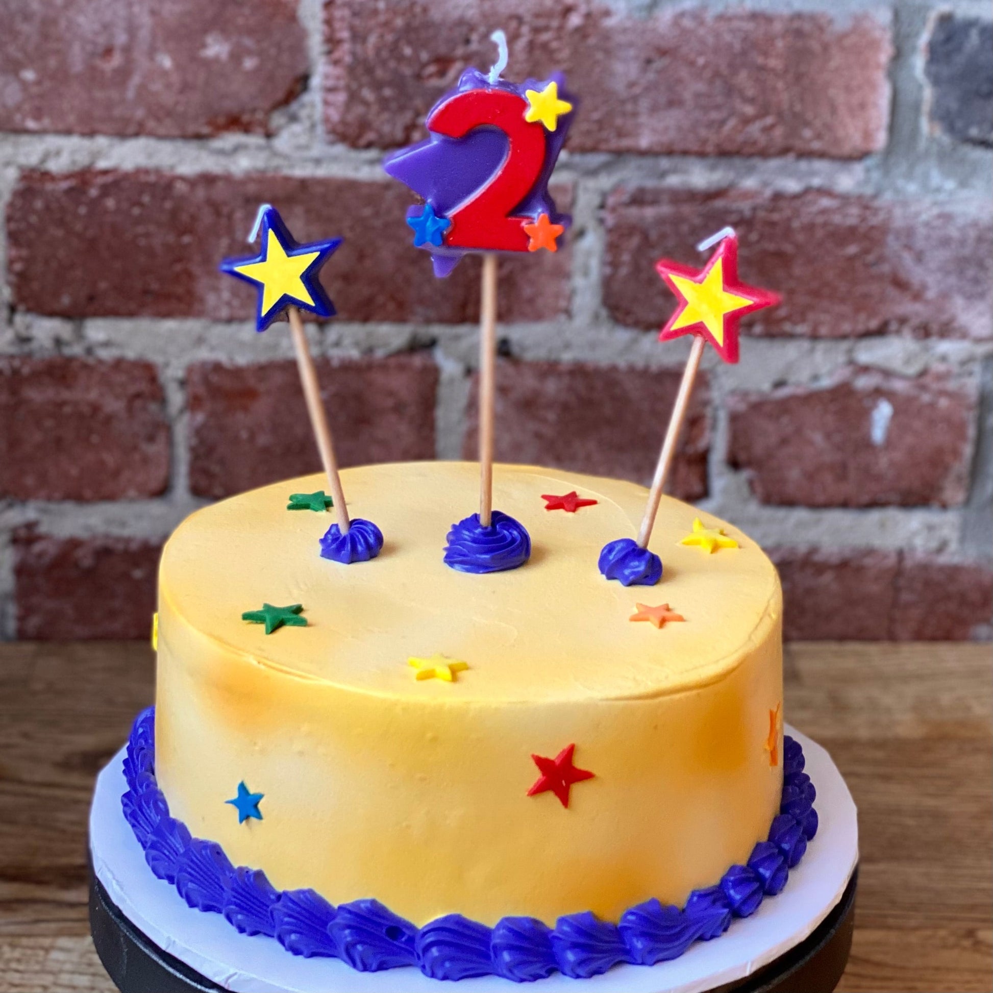 Kids birthday cake with candle of number two