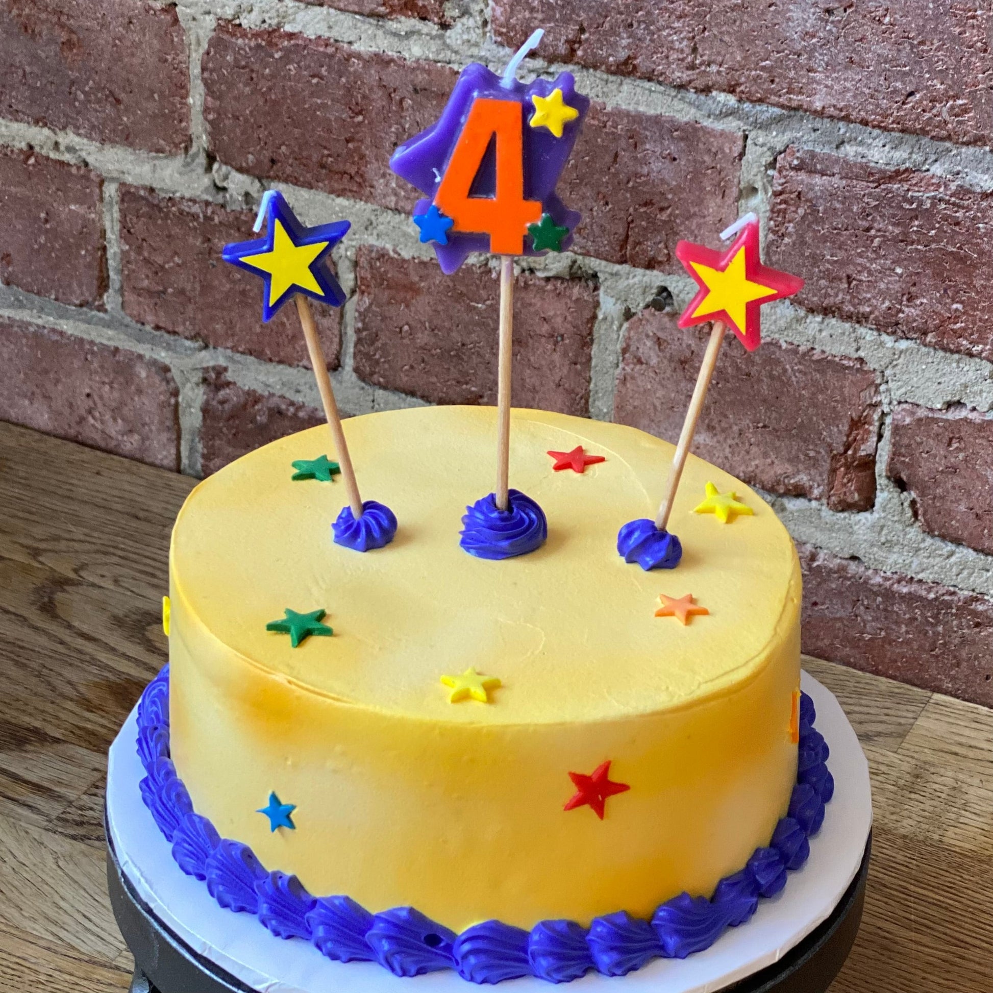 Kids birthday with a candle of the number four
