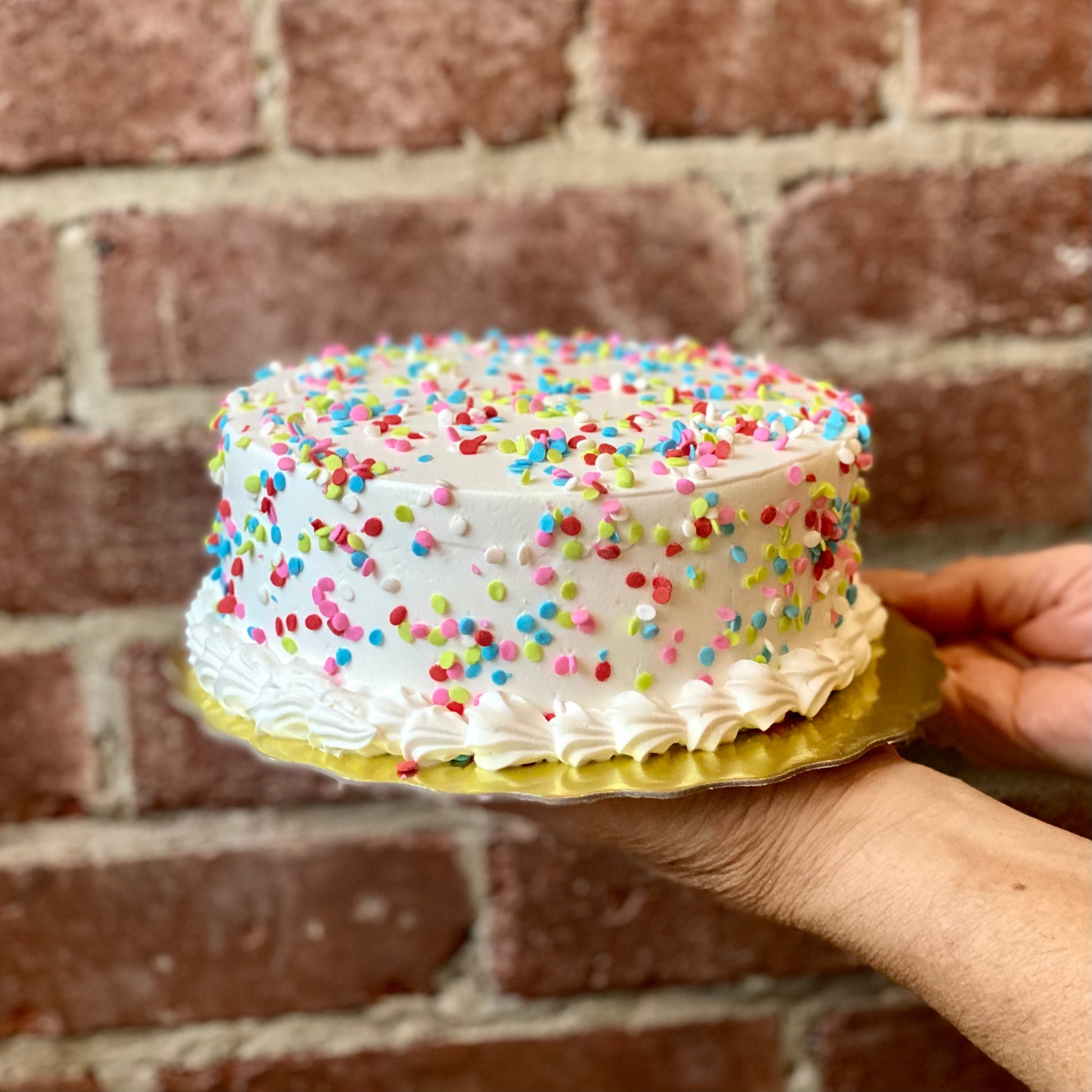 Plain white vanilla cake with confetti sprinkles