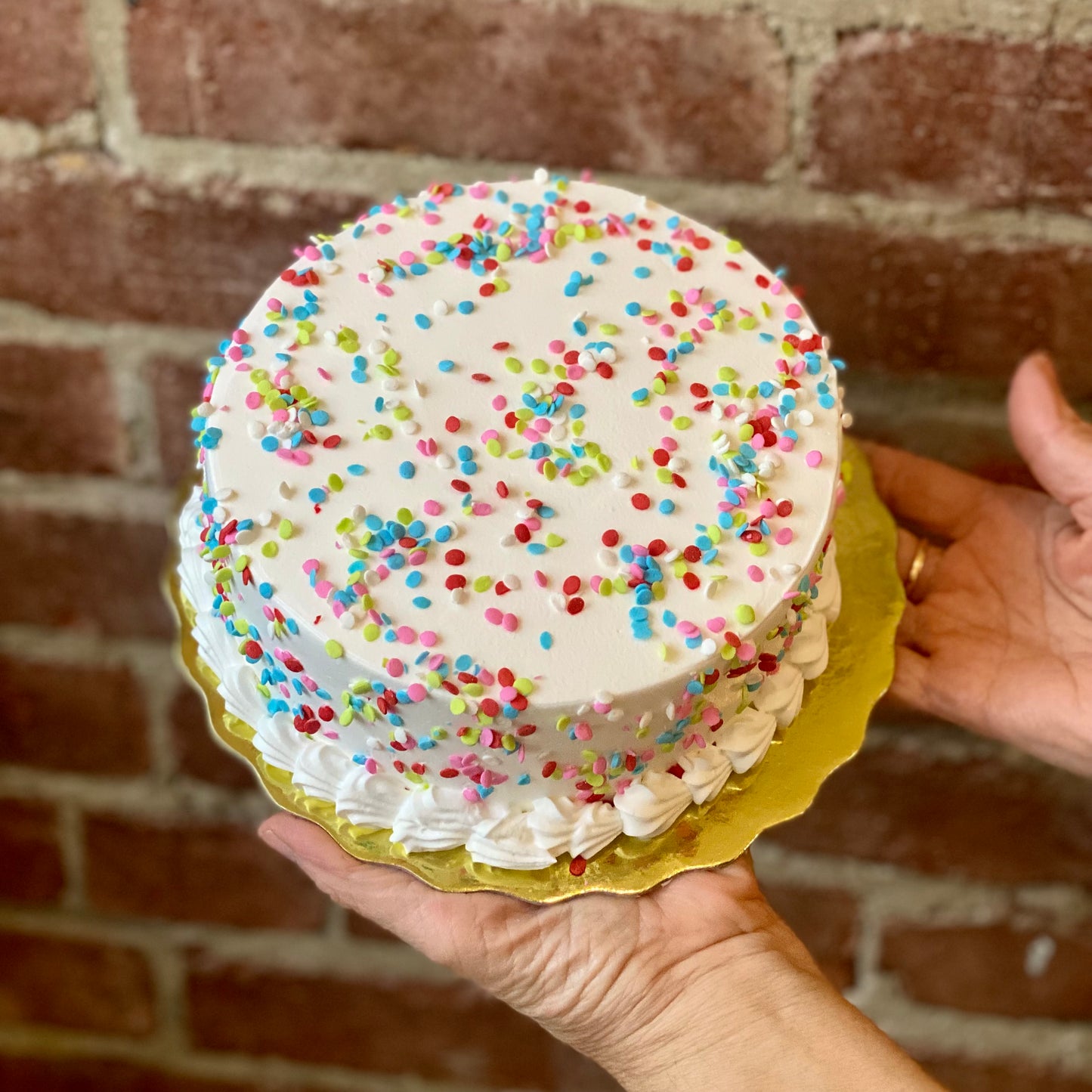 Plain white cake with confetti sprinkles