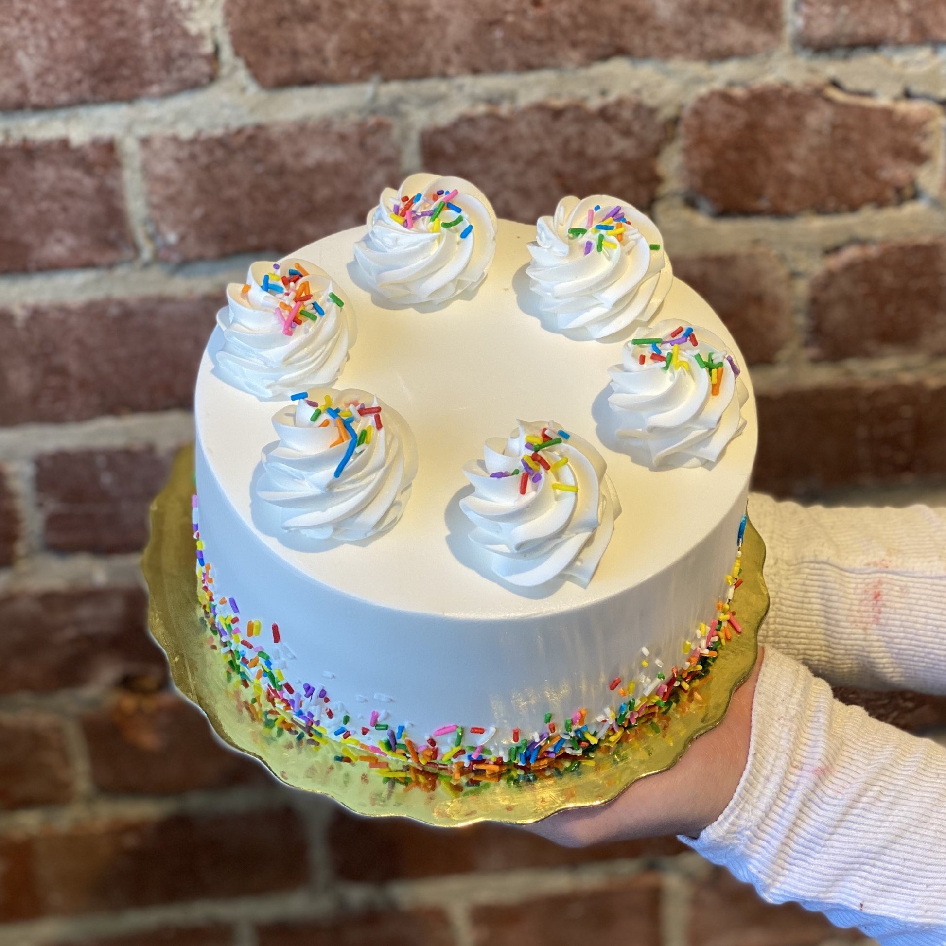 Vanilla cake with colourful sprinkles